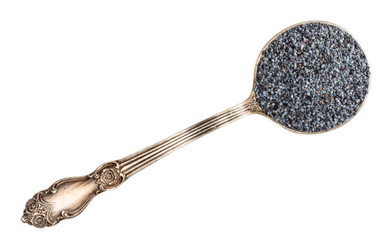 top view of poppy seeds in tablespoon cutout