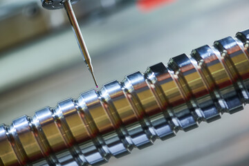 quality measuring in metal cutting industry. probe measure ball screw threaded shaft