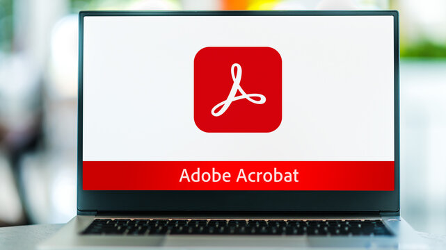 Laptop computer displaying logo of Adobe Acrobat