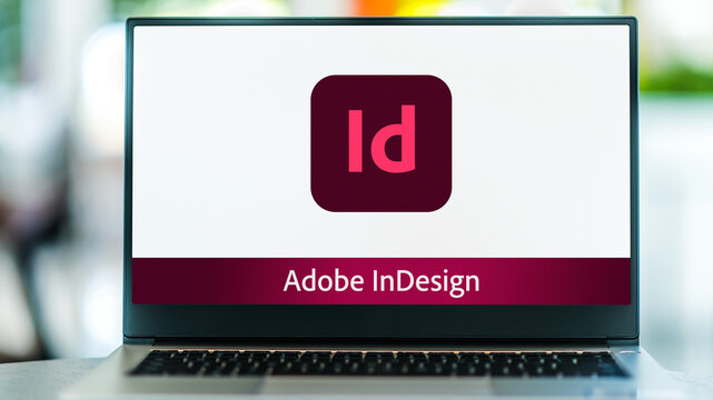 Laptop computer displaying logo of Adobe InDesign