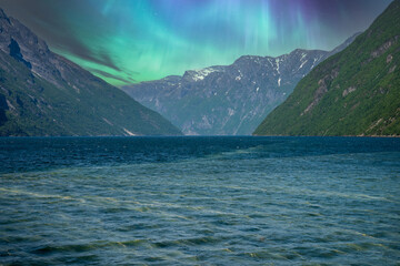 the auroras over the mountains and glaciers of Norway.