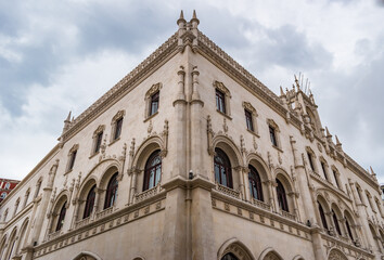 Fototapeta premium Perspective of a building with Manueline decoration at the Rossio train station, Lisbon PORTUGAL