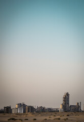 sunset over a factory