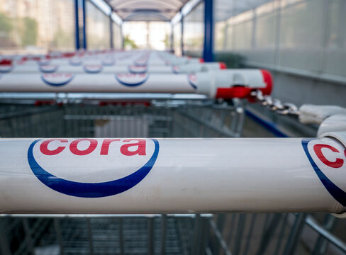 Bucharest/Romania &ndash; 04.27.2020: Shopping carts belonging to Cora Hypermarket. Logo of the French retailer Cora.