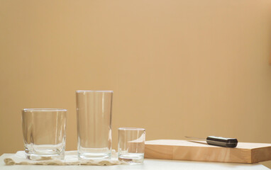 The Empty glass, clear clean glass placed on the tablespace.