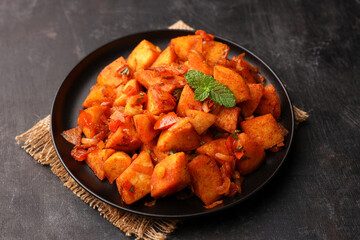 Masala Idli or Masala idly coconut chutney green chutney popular breakfast of Kerala Tamil Nadu South India and Sri Lanka. Healthy steamed rice cakes steaming fermented batter of black lentils , rice.