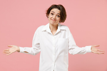 Young doubtful employee business woman corporate lawyer in classic formal white shirt work in...