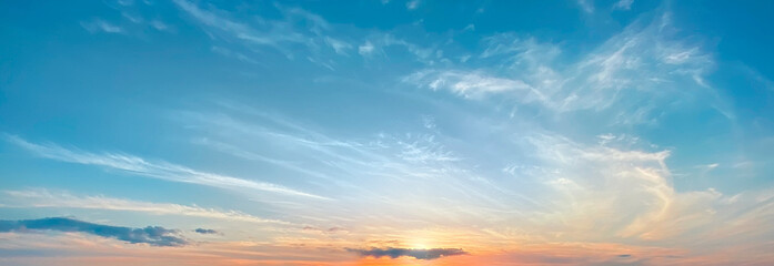 Fototapeta na wymiar Dramatic sunset blue sky, banner.