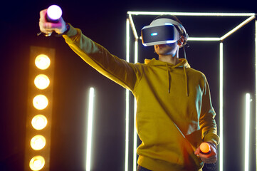 Male gamer using virtual reality headset