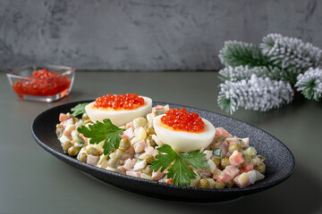 Olivier salad is a traditional Russian dish seasoned with mayonnaise, an essential attribute of the...