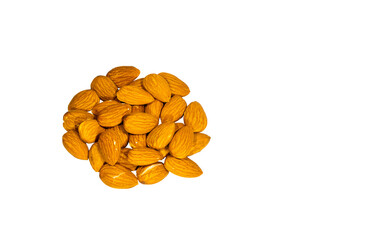 Dried almonds piled on a white backdrop. Clipping path.