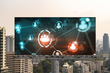 World planet Earth map hologram and social media icons on billboard over panorama city view of Bangkok, Southeast Asia. The concept of people networking and connections.