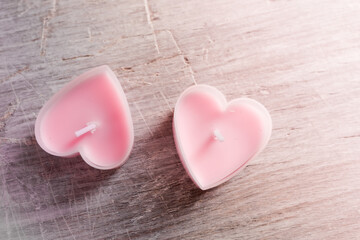 pink heart on wooden background