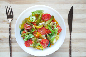 fresh vegetable salad bowl on table,