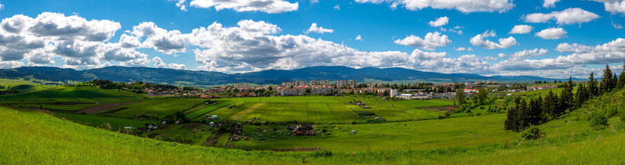 Fototapeta na wymiar Panoramic view of the town of Csikszereda in hungarian, Miercurea Ciuc in romanian in Romania at springtime.
