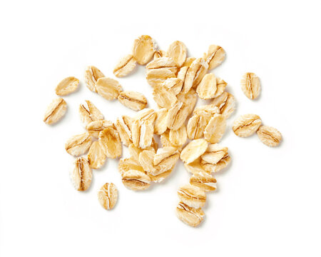 Oat flakes isolated on white background. Flakes for oatmeal and granola. Image of oat flakes for you design.