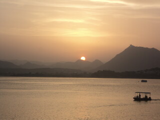 A picture of sunset in the Aravalli Mountains, taken from around the Pichola Lake Near City Palace.