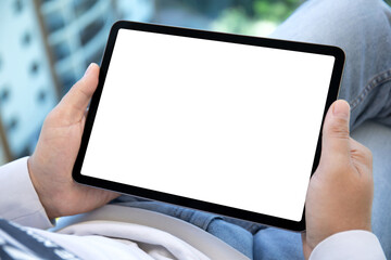 male hands holding computer tablet with isolated screen in office