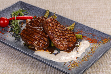 Grilled beef steak served pepper