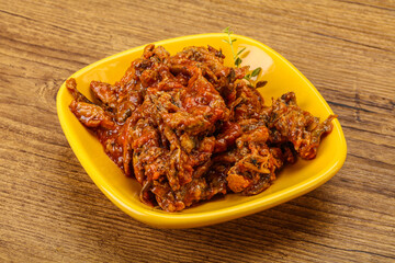 Canned anchovy in tomato sauce