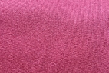 Pink fabric texture background. Textile background with copy space. Space for text.