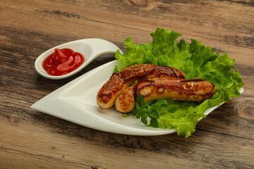 Roasted chicken white sausages with ketchup