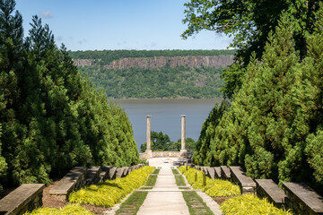 Fototapeta premium Yonkers, NY - USA - May 27, 2021: A view of The Vista, a long descending staircase culminating in the Overlook at the Untermyer Park and Gardens.