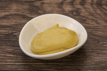 Dijon mustard sauce in the bowl