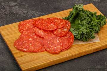 Italian spycy pepperoni sausage slices