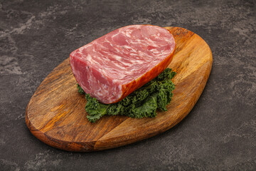 Beef ham piece over board