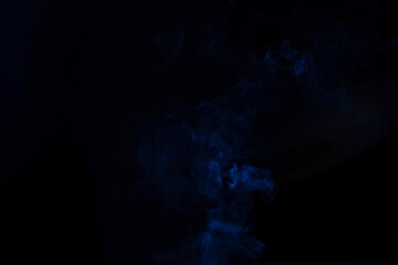 Blue and pink steam on a black background.