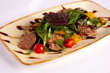 Veal with vegetables and sauce