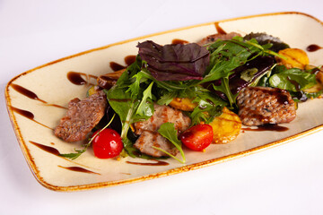 Veal with vegetables and sauce