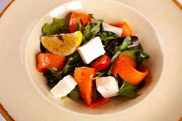Salad with red fish and soft cheese