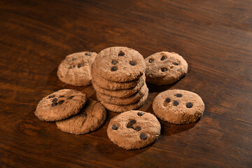 chocolate cookies on wooden background