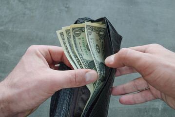 Banknotes of one American dollar in the wallet