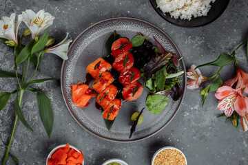 Japanese sushi -red dragon. Avocado, salmon and sushi cheese. Top view