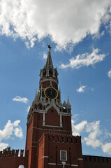 Close-up of the Kremlin's Spasskaya Tower. Clock tower chimes. Moscow, Russia, May 25, 2021