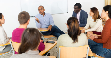 Coach conducts business training at the university