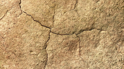 Cracked soil surface, brown rough surface, according to the concept of drought or lack of moisture. Suitable for background