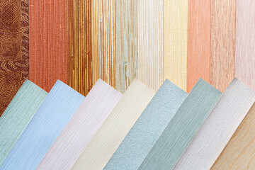 Samples for selecting the color of the interior walls. Book of Wallpaper samples for the designer's...
