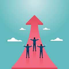 Fototapeta premium Business team standing on arrow flying to success