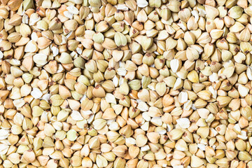 background - top view of raw green buckwheat