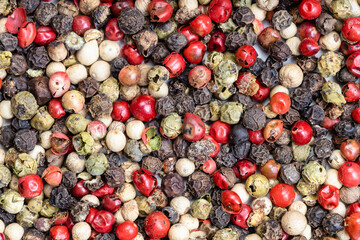 background - Four Pepper Blend peppercorns