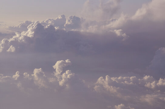 the view from the plane to the beautiful clouds