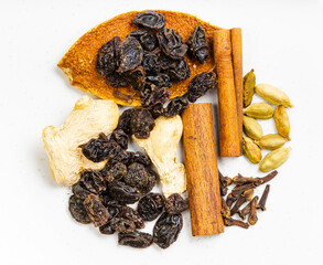 top view of dried Mulling spices on gray plate