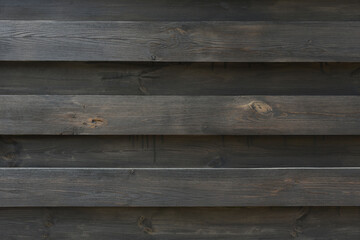 Naklejka premium new wood fence covered with stain
