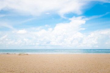 Blurry tropical sea and beach with blue sky.