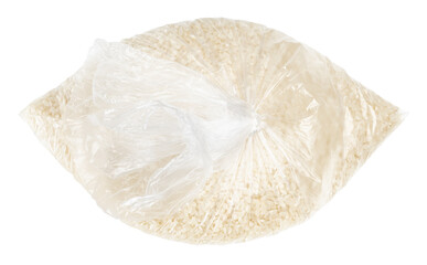 uncooked white rice in tied plastic bag isolated