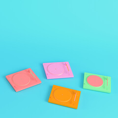 Colorful turntables on bright blue background in pastel colors. Minimalism concept